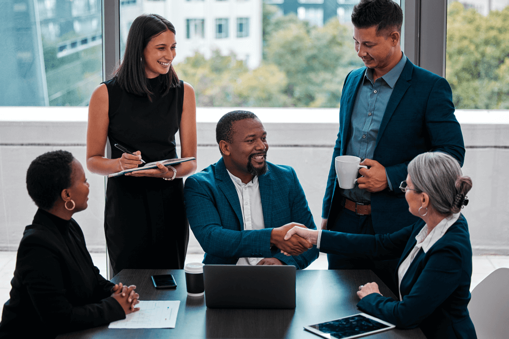 Businessman,Shaking,Hands,To,Seal,A,Deal,With,His,Partner